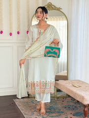 White embroidered kurta set with green clutch