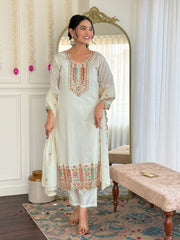 White embroidered kurta set with green clutch